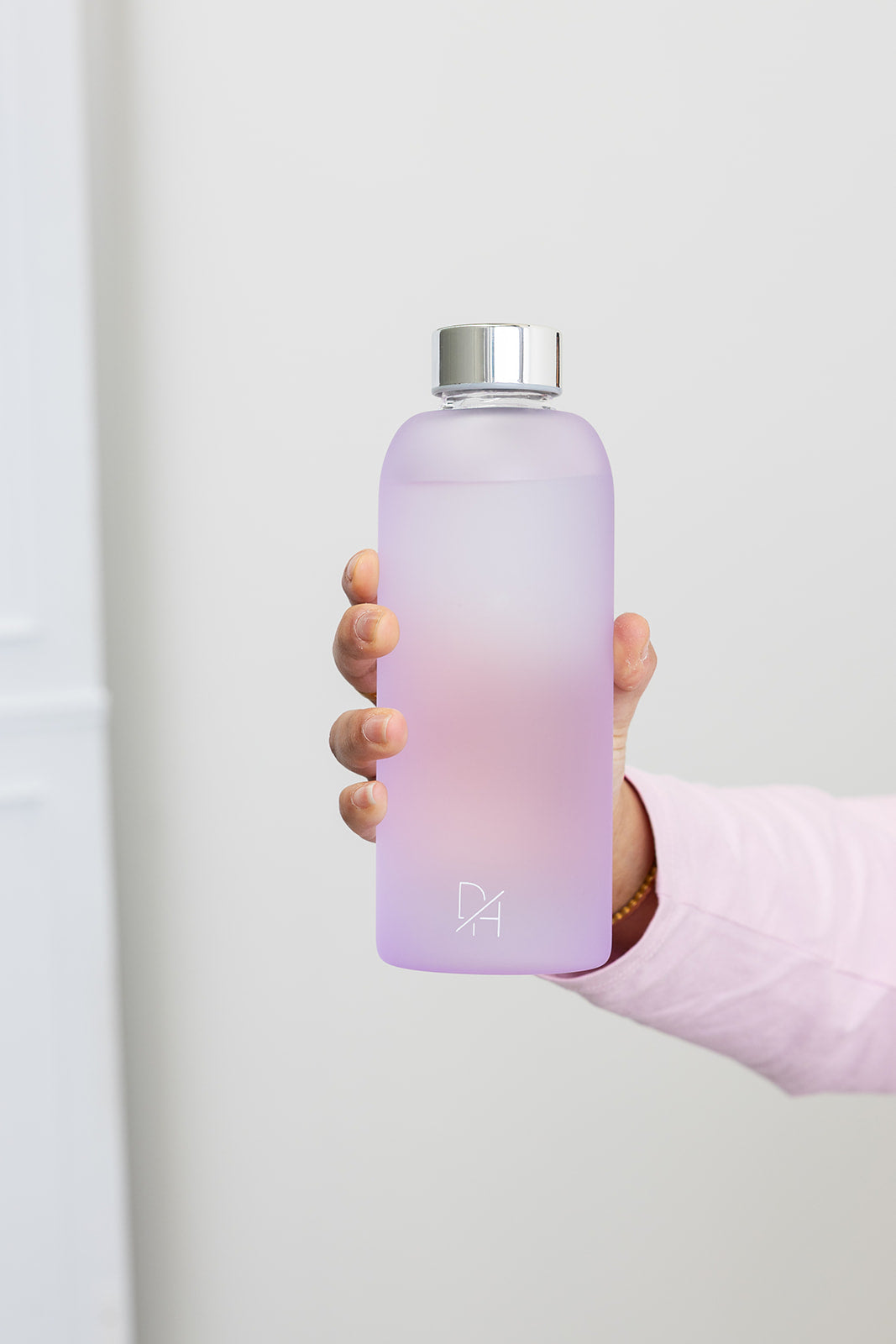 eco friendly glass water bottle in purple tint